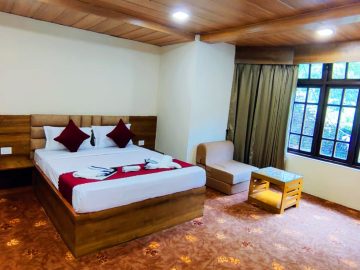 Superior Orange Garden View Double Bedded Balcony Room