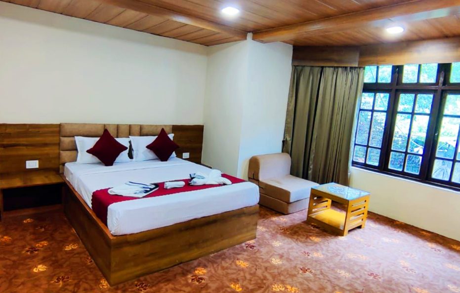 Superior Orange Garden View Double Bedded Balcony Room